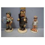 Three early Hummel figures - drinker, coal boy & l