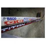 Three autographed hockey sticks