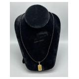 14kt 1g pendant on black pearl necklace with 14kt