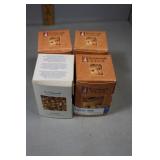 Four Hummel Club figures in box