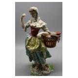 Porcelain figure of lady with basket