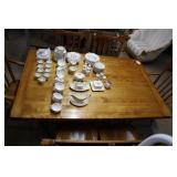 Dining table with six dining chairs with spindle b