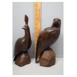 Two ironwood carved birds