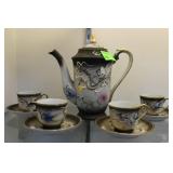 Dragonware teapot with four cups & saucers