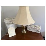 Dresser grouping: lamp, Wicker waste basket and ti