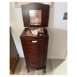 8-drawer upright jewelry cabinet with contents