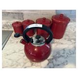Four pc red graduated canister set and red coffee