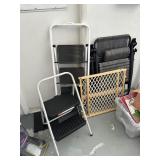 Two step ladders, folding lounge chair, and pet ga