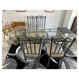 Contemporary glass and cast metal dining room tabl
