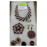 Costume rhinestone grouping with red and transpare