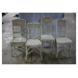 Four complementary white wicker side chairs