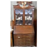 Dropfront secretary with four drawers, paw feet,