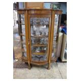 Oak beveled china cabinet with glassfront, four sh