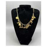 14kt gold necklace w/ Fourteen 14kt charms 29.1gtw