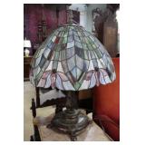 Stained glass shaded table lamp with floral drape