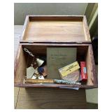 Cedar box with advertising trinkets - trowel, ciga