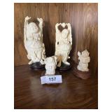 Four resin Buddha figures