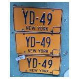 Three New York license plates