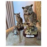 Three owl figures in porcelain