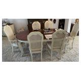 French Provincial style dining room table with 6 c