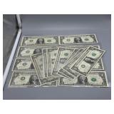 Sixteen US $1 Federal Reserve Notes - 15 are star