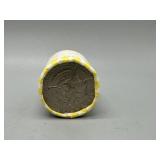 One $10 Roll of uncirculated half dollars