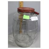 Wilson's glass jar with tin lid & wood handle