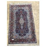 Hand knotted throw rug 68' x 36' in blue floral to