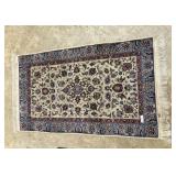 Hand knotted throw rug 68' x 38' in blue &  red to
