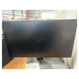 Two Dell monitors w/ adjustable stands