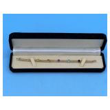 14KT LINK BRACELET 7.5" L WITH 5 RAISED STONES -