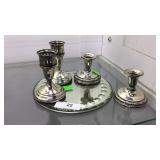 Four sterling silver candle holders w/ cut to