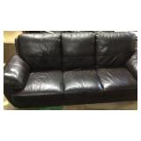 Dark brown leather like 3 pad sofa.84 in long