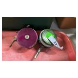 Red South Bend and Green Fishing Reels
