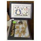 Framed needle point & tray gold costume jewelry,