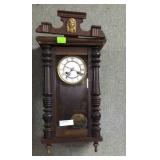 Colonial style wall clock w/ porcelain face