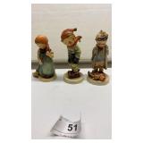 Three Hummel figures: sweeper girl, cold weather