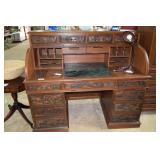 Very ornately carved roll top desk
