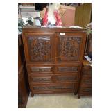Teak oriental carved front bachelors chest