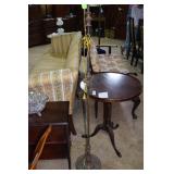 Cast metal floor lamp with  floral decorated base