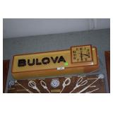 Bulova lighted sign with clock.