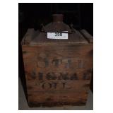 Star oil can in a wooden crate