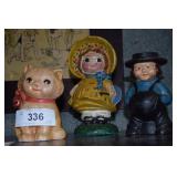 3- Cast Iron Banks, 1- Sitting Kitten W/ Bow, 1-