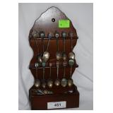 20souvenir spoons / 1 fork & rack.Collected from