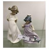 2x Nao figurines: girl with pigtails & girl with