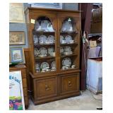 4 door China hutch.Dome shaped glass inserts on