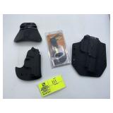 GROUP OF CUSTOM MOLDED HOLSTERS AND VERSA CARRY HO