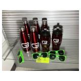 GROUP OF CYCLEBAR WATER BOTTLES AND SUNGLASSES . L