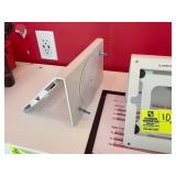 GROUP OF THREE WALL MOUNT TABLET HOLDERS.