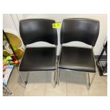 PAIR OF METAL FRAMED CHAIRS. LOT LOCATED IN CARY